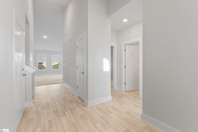 corridor featuring light wood-type flooring