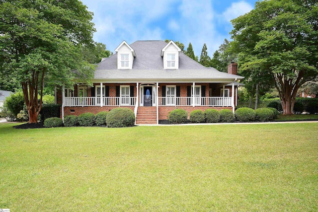 view of front of property with a porch and a front yard