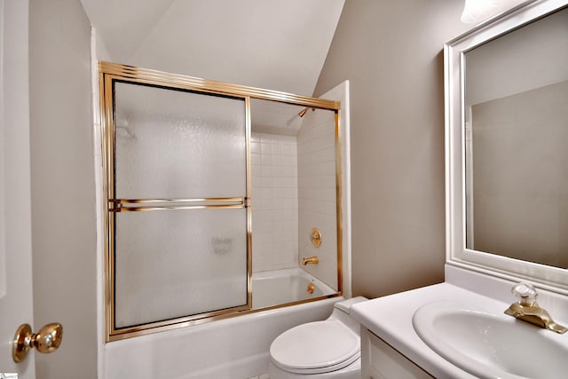 full bathroom with combined bath / shower with glass door, vanity, toilet, and lofted ceiling