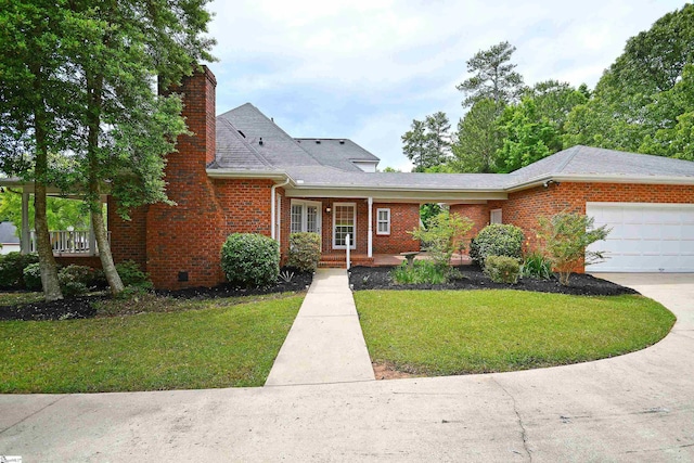 view of front facade featuring a front lawn and a garage