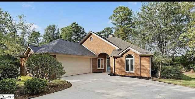 view of front of home with a garage