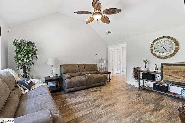 living room featuring ceiling fan, high vaulted ceiling, and hardwood / wood-style flooring