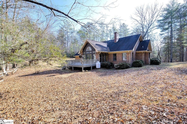 view of front of house featuring a wooden deck