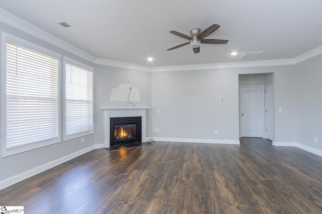 unfurnished living room featuring ceiling fan, dark wood-type flooring, and crown molding