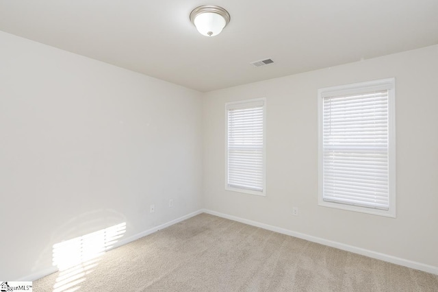 view of carpeted spare room