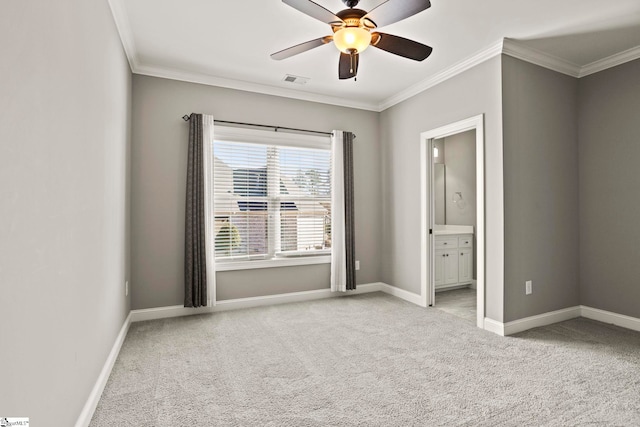 unfurnished bedroom with light carpet, ceiling fan, ensuite bathroom, and ornamental molding