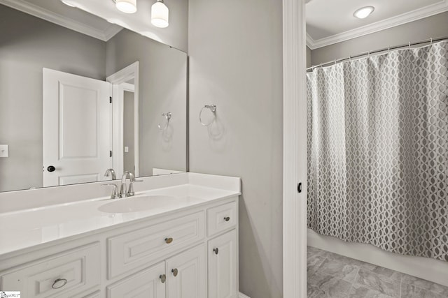 bathroom featuring vanity, crown molding, and a shower with curtain