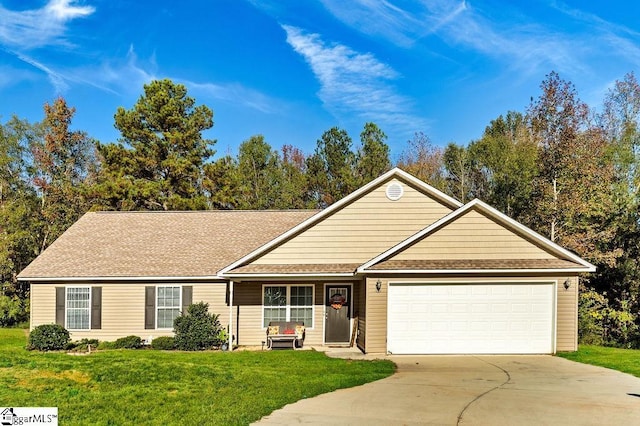 ranch-style home with a front yard and a garage