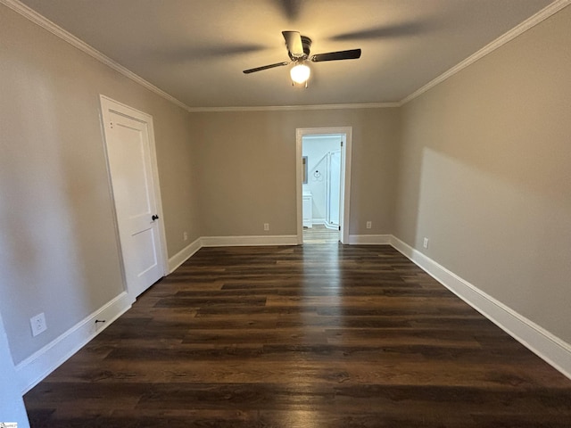 unfurnished room featuring ceiling fan, dark hardwood / wood-style flooring, and ornamental molding