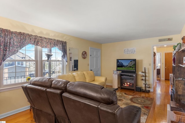 living room featuring light wood-type flooring