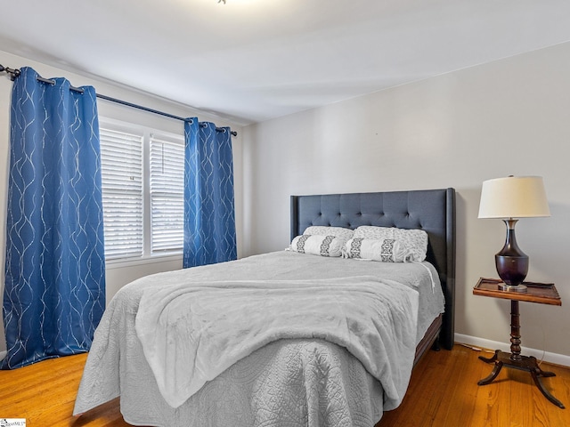 bedroom featuring wood-type flooring