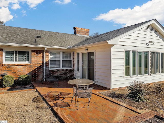 back of house featuring a patio