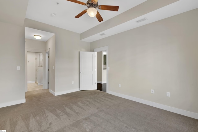 interior space with light colored carpet and ceiling fan