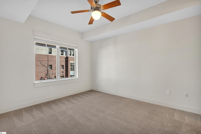 unfurnished room featuring carpet floors and ceiling fan