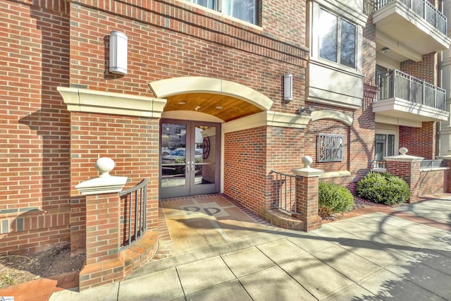 property entrance featuring french doors