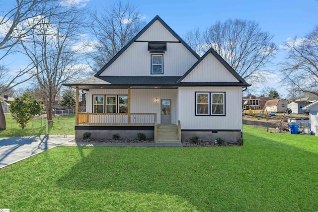 view of front of home featuring covered porch and a front lawn