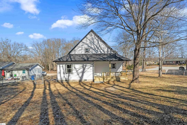 view of home's exterior featuring a yard