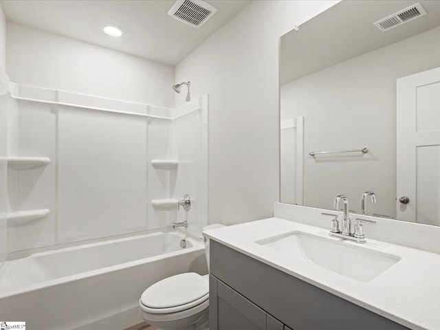 bathroom featuring shower / washtub combination, visible vents, vanity, and toilet