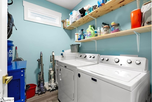 washroom featuring washer and dryer and hardwood / wood-style floors