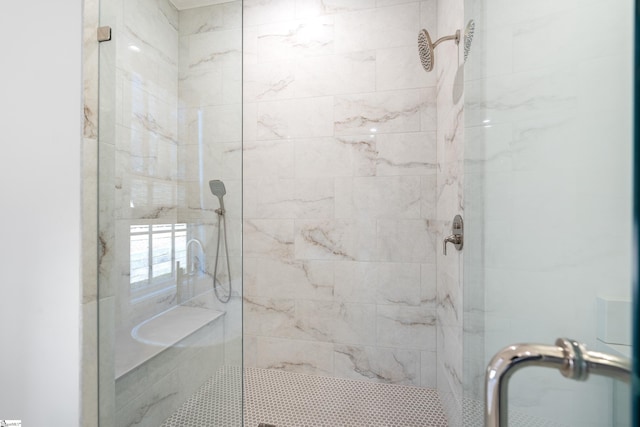 bathroom featuring an enclosed shower