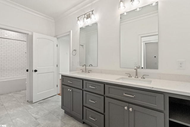 bathroom with shower / tub combination, vanity, and crown molding