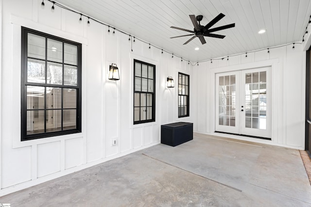 view of patio / terrace featuring ceiling fan and french doors