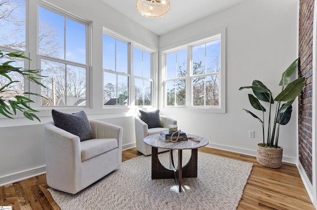 sitting room featuring hardwood / wood-style floors