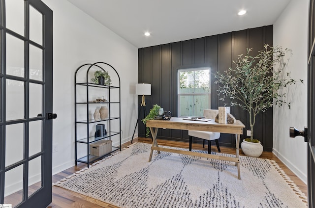 home office featuring hardwood / wood-style flooring
