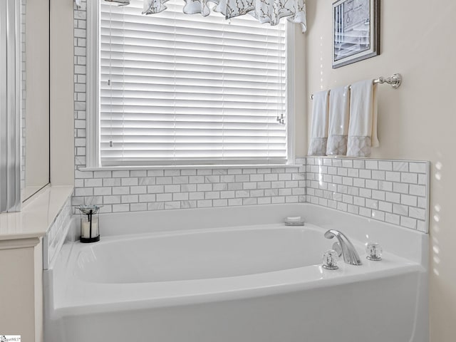 bathroom with a tub