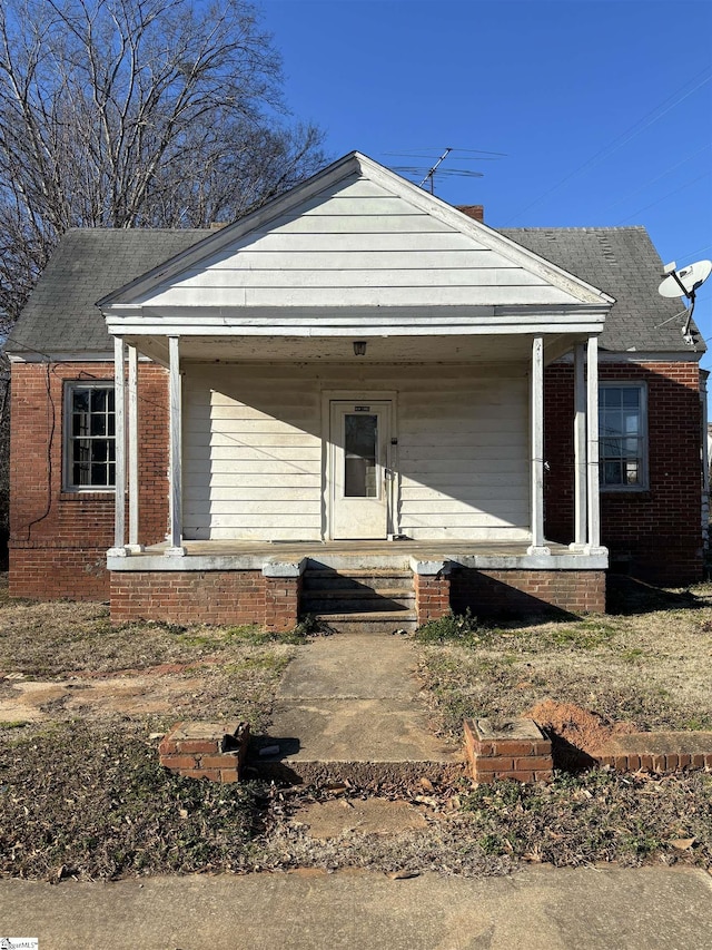 view of front of home featuring covered porch