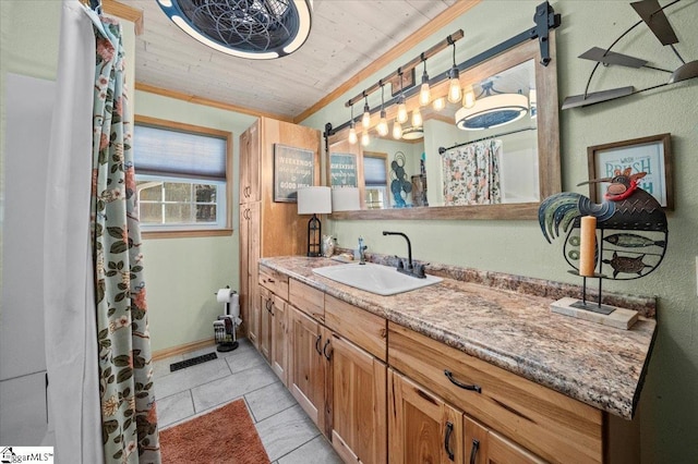 bathroom featuring vanity, wood ceiling, tile patterned floors, and crown molding