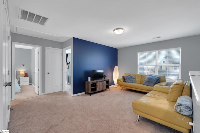 living room featuring light colored carpet