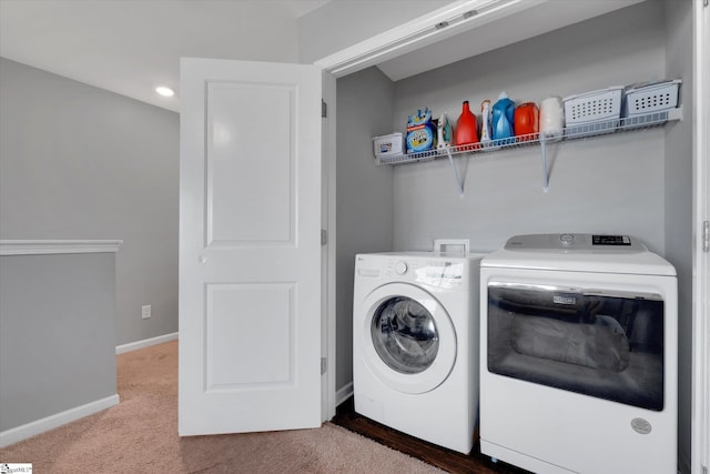 laundry area featuring carpet and washer and dryer