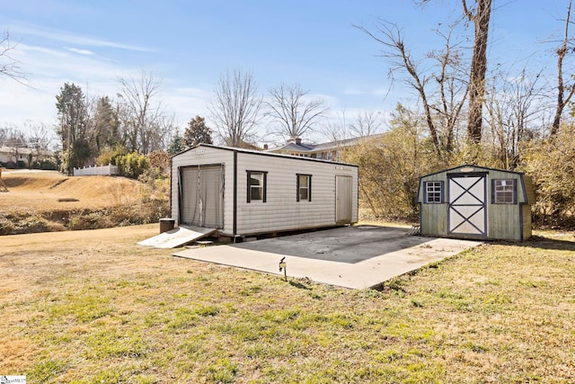 view of outbuilding featuring a lawn