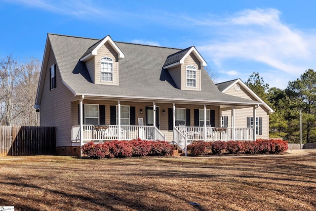 view of front of house featuring a front yard and a porch