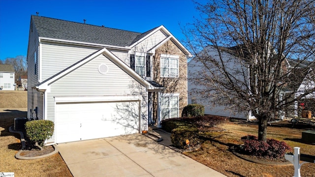 view of front property with a garage