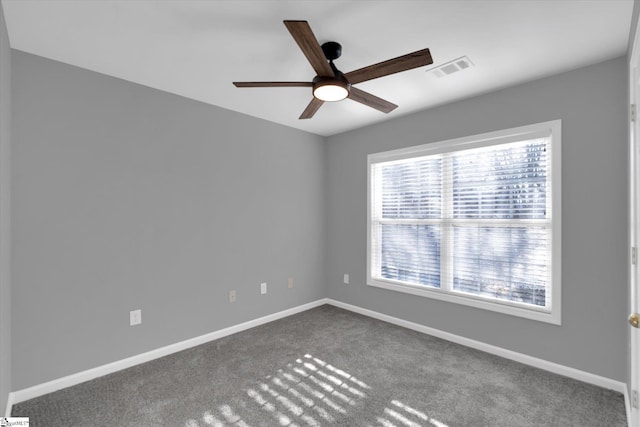 unfurnished room with carpet floors and ceiling fan