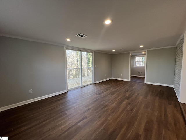 unfurnished room with crown molding and dark hardwood / wood-style flooring