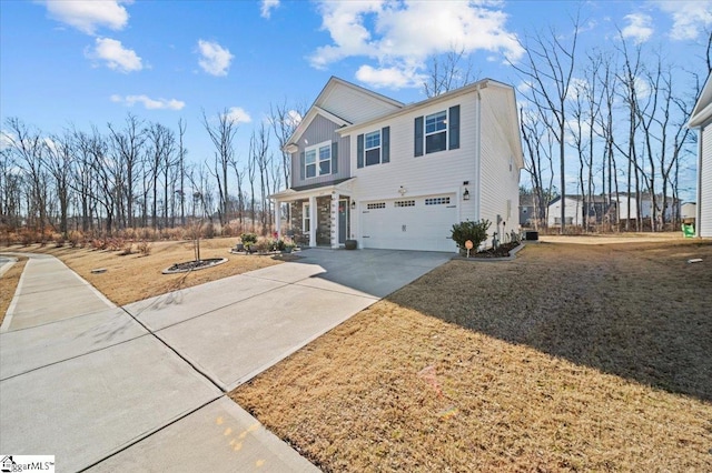 view of front facade with a garage and a front yard