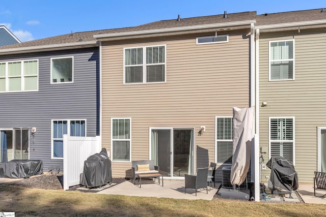 back of house featuring a patio area