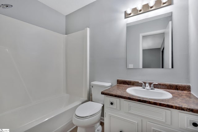 full bathroom featuring vanity, toilet, and shower / bathtub combination