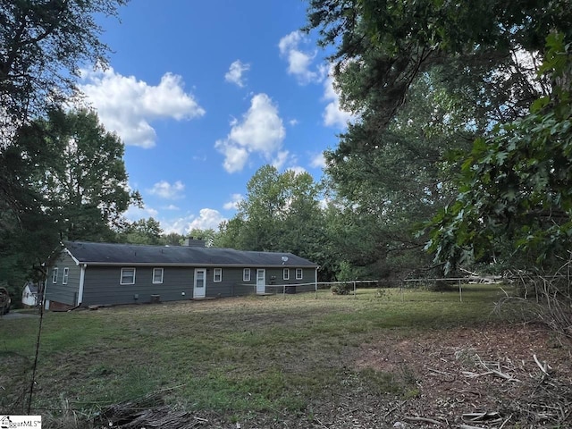 exterior space with a yard