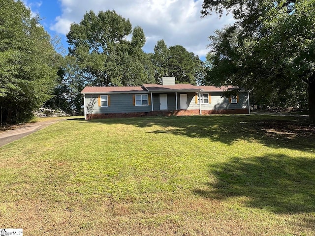 view of front of property with a front lawn