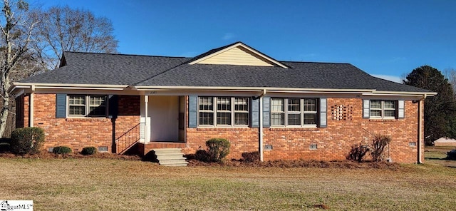 single story home featuring a front yard