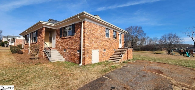 view of home's exterior with a yard