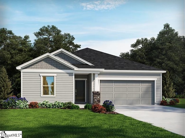 view of front of house with a garage and a front yard