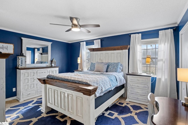 bedroom featuring crown molding, light colored carpet, a textured ceiling, and ceiling fan