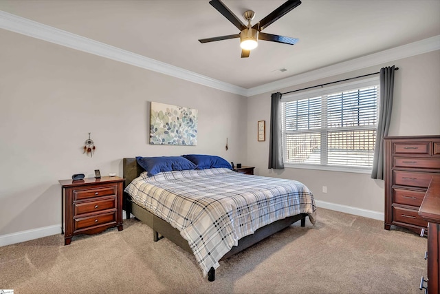 bedroom featuring crown molding, light colored carpet, and ceiling fan