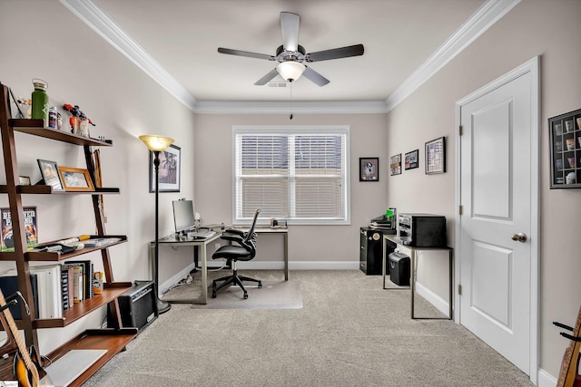 carpeted office space with ceiling fan and crown molding