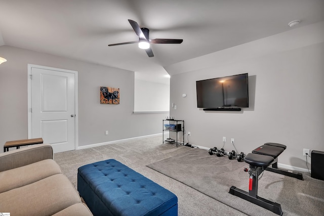 exercise room featuring ceiling fan and light carpet